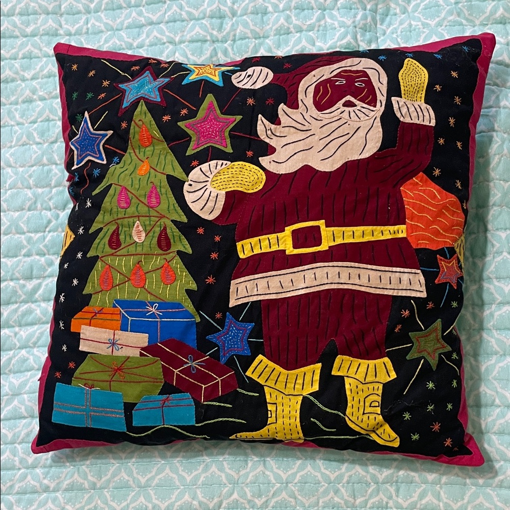 Santa Claus at the Christmas tree mola pillow